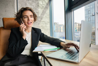 Businesswoman working at office