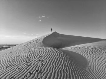 Scenic view of desert against sky