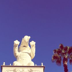 Low angle view of statue against clear sky