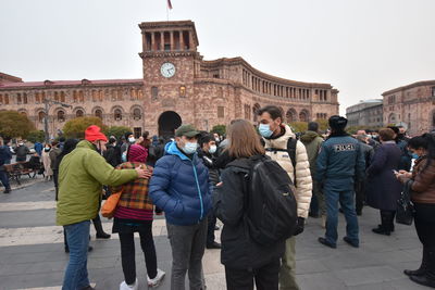 Group of people in front of historical building