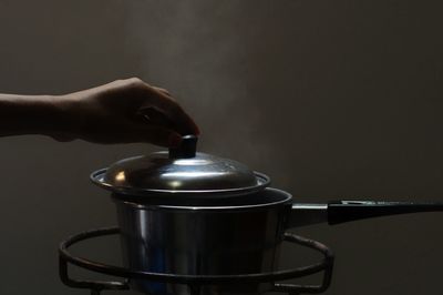 Person holding tea cup