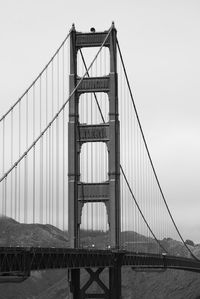 Low angle view of suspension bridge