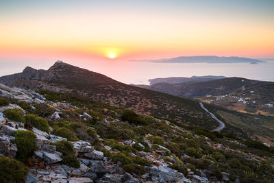 Sunset over mountains near kamares village on sifnos island, greece.