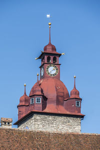 Tower of building against clear blue sky