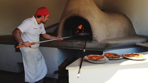 Man working with food