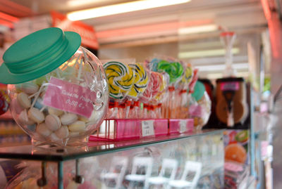 Candies on glass shelf for sale in shop