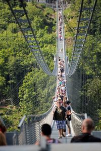 People on rope bridge