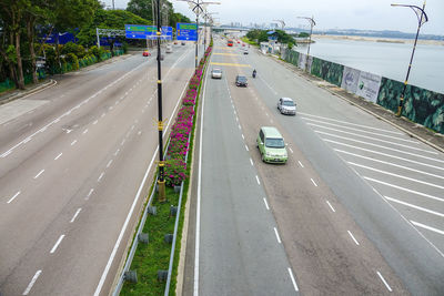 High angle view of cars on street in city