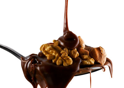 Close-up of chocolate cake against white background
