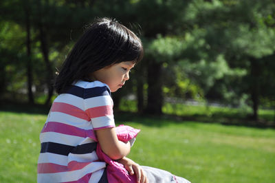 Close-up of girl looking down