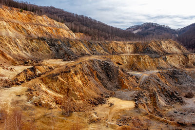 Old abandoned copper and gold surface mine in apuseni mountains, romania