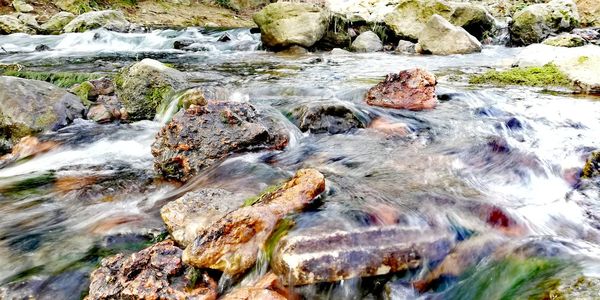 Stream flowing through rocks