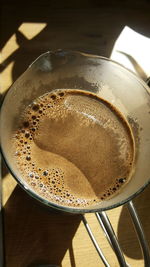 High angle view of coffee on table