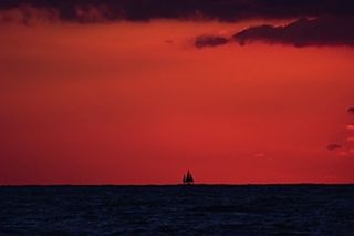 Scenic view of sea at sunset