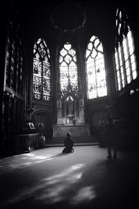 Woman in dark room