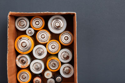 Batteries in box on table