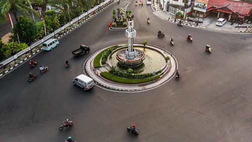 High angle view of vehicles on road in city