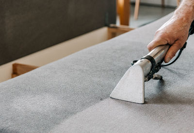 Close-up of man working on table