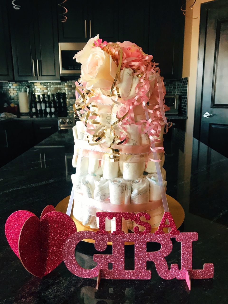 CLOSE-UP OF HEART SHAPE CAKE ON DISPLAY AT HOME