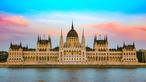 View of historic building against sunset