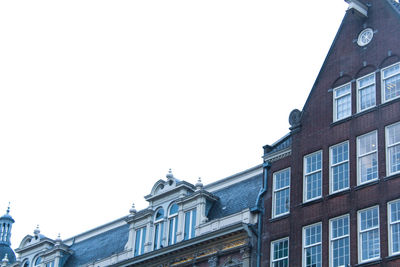 Low angle view of buildings against clear sky