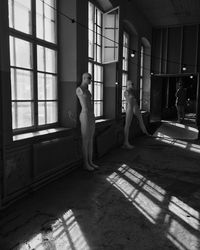 Old mannequins in abandoned warehouse