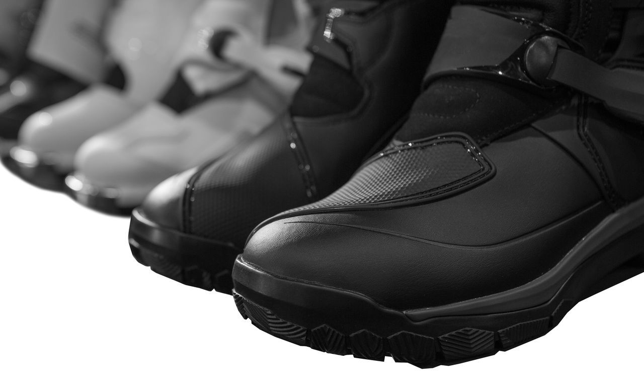 black, footwear, shoe, black and white, clothing, fashion, leather, close-up, adult, indoors, limb