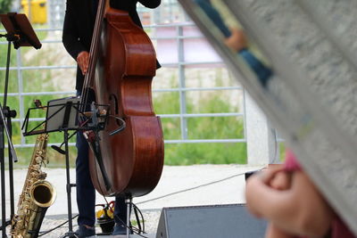 Close-up of person playing piano