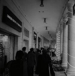 People in illuminated room