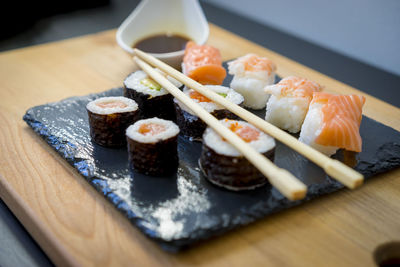 Close-up of sushi served on table