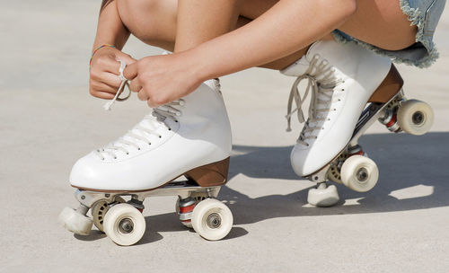 Low section of child on skateboard