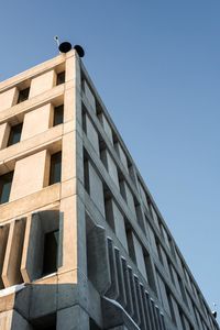 Low angle view of building against clear sky