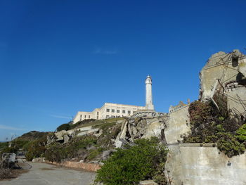 Low angle view of building against blue sky