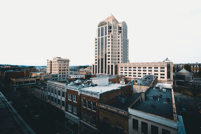 View of skyscrapers against clear sky