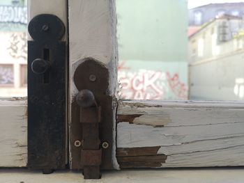 Close-up of old wooden door of building