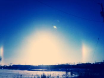 Sun shining through clouds