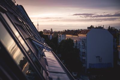 Cityscape against sky during sunset