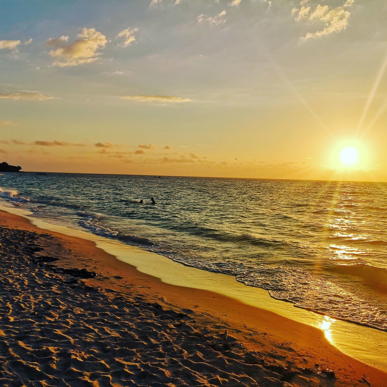 sky, sea, sunset, water, beach, land, scenics - nature, beauty in nature, horizon, horizon over water, sun, cloud - sky, sunlight, sand, tranquility, tranquil scene, nature, idyllic, orange color, lens flare, no people, outdoors