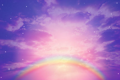 Low angle view of rainbow against sky