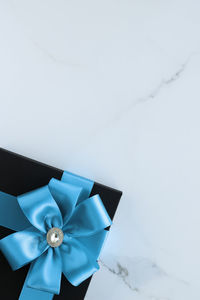 Close-up of gift box on white background