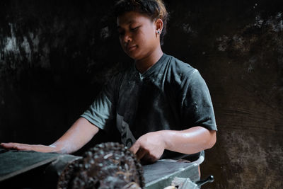 Woman working in workshop