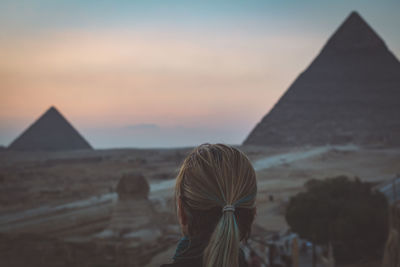 Rear view of a desert at sunset