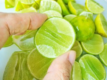 Close-up of hand holding fruit