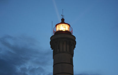 Lighthouse against blue sky