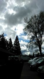 Cars on road against sky