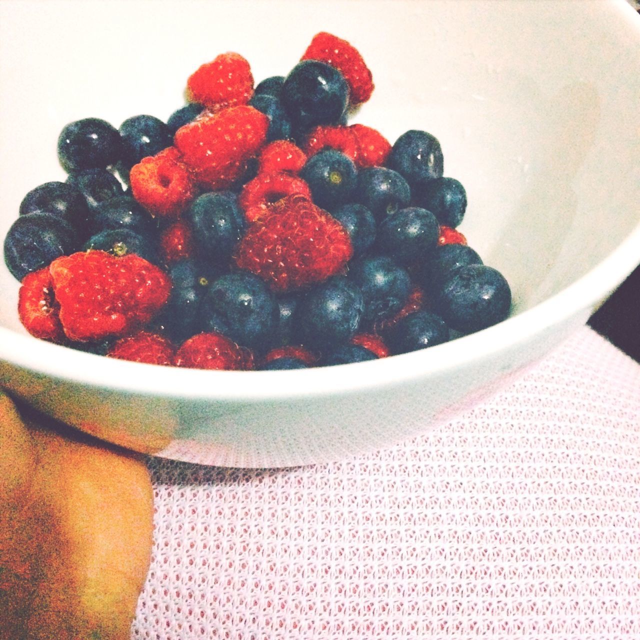 food and drink, food, fruit, freshness, indoors, healthy eating, strawberry, raspberry, red, bowl, still life, sweet food, berry fruit, blueberry, ready-to-eat, plate, table, berry, indulgence, high angle view