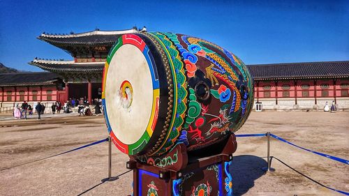 Multi colored building against blue sky