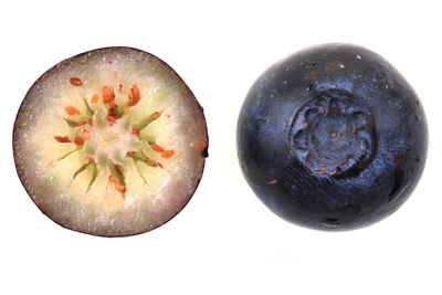 Directly above shot of fruits against white background