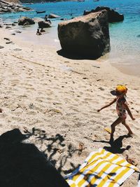 High angle view of child on beach