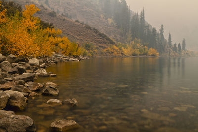 Morning view of convict lake through the smoke of the creek fire